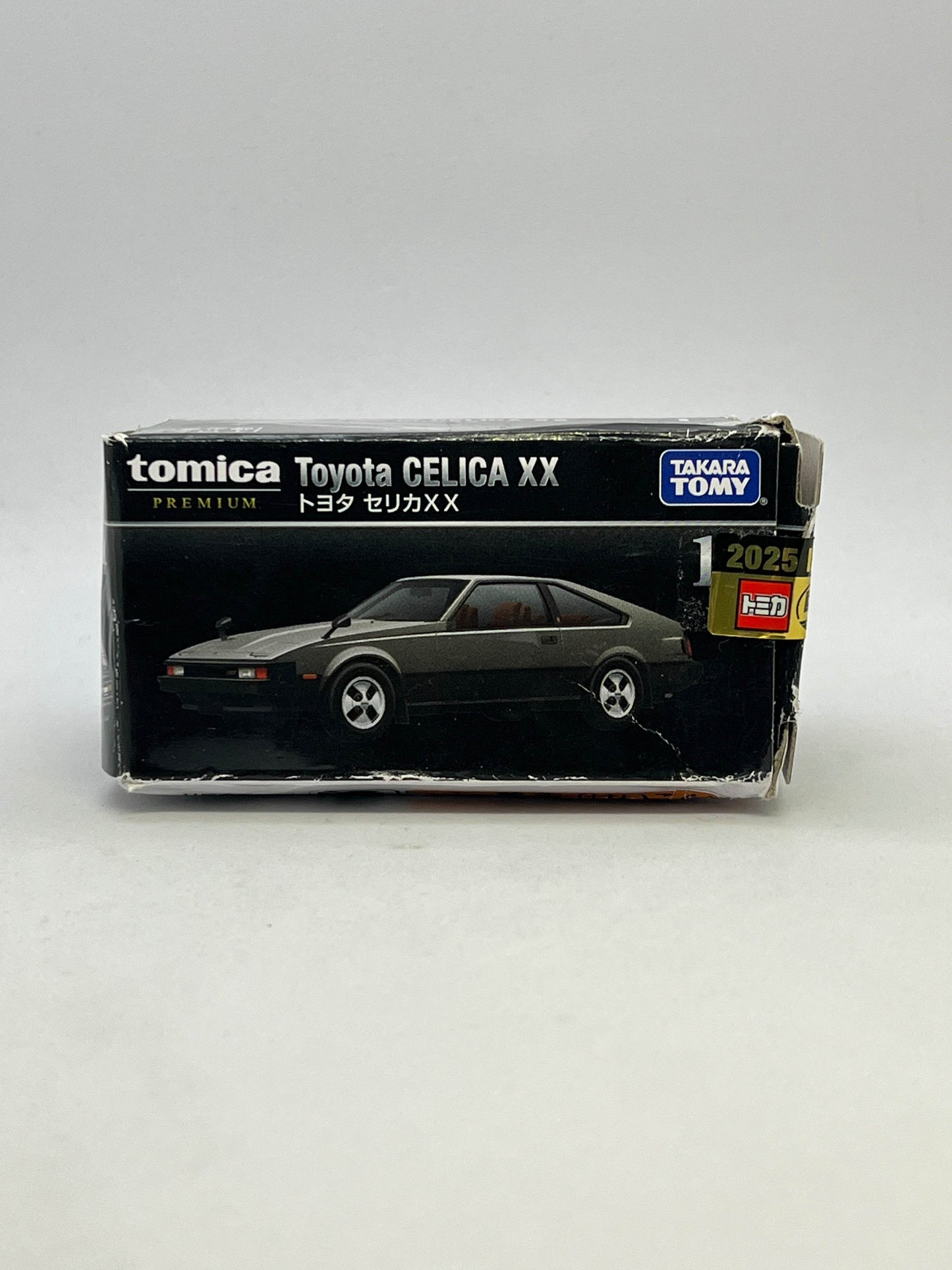 TOMICA - PREMIUM - TOYOTA CELICA XX - OUTER BOX DAMAGED - Its Fun