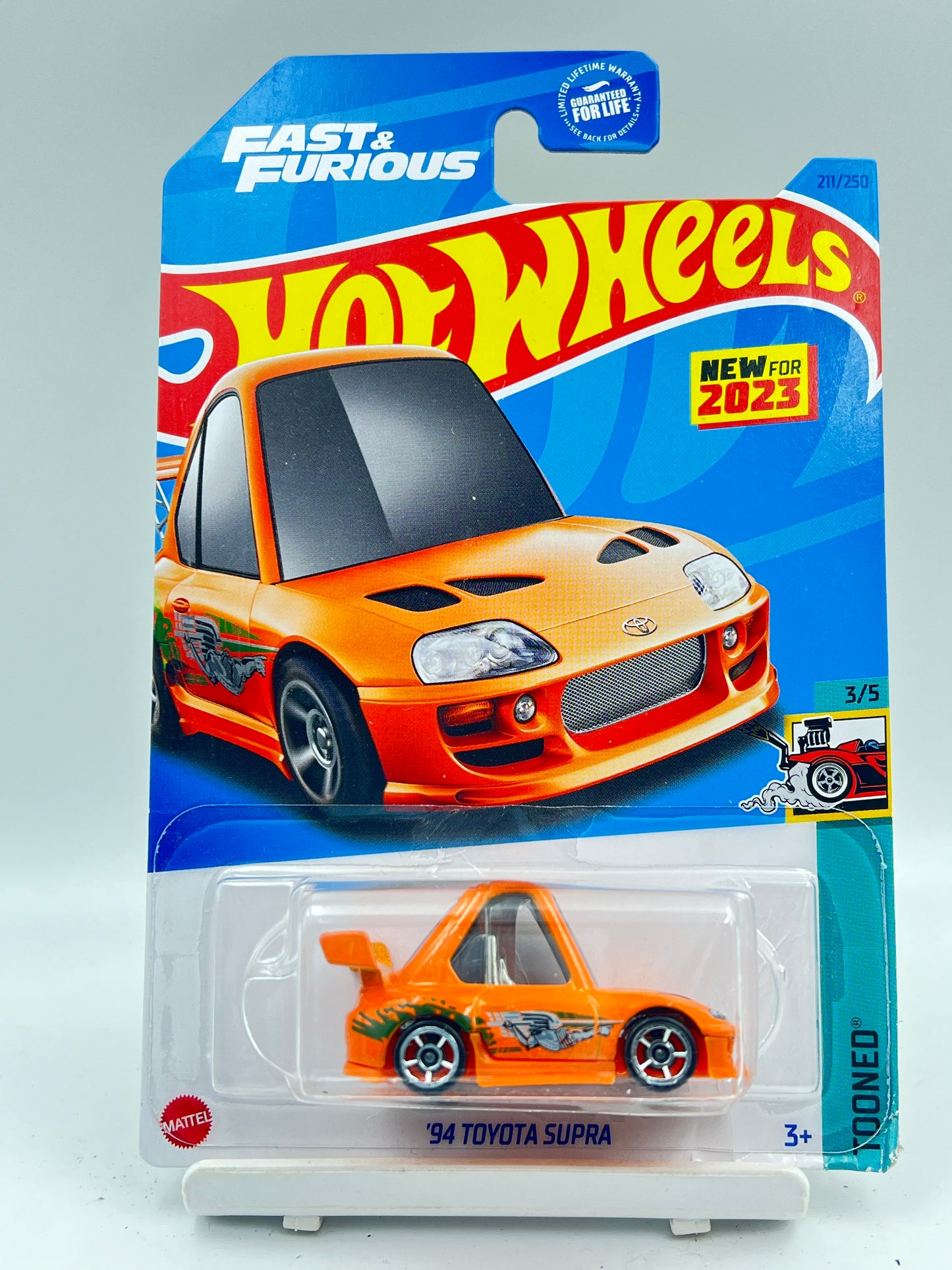 MILD CARD DAMAGE - HOT WHEELS - AT BOTTOM - TOONED 94 TOYOTA SUPRA - C2