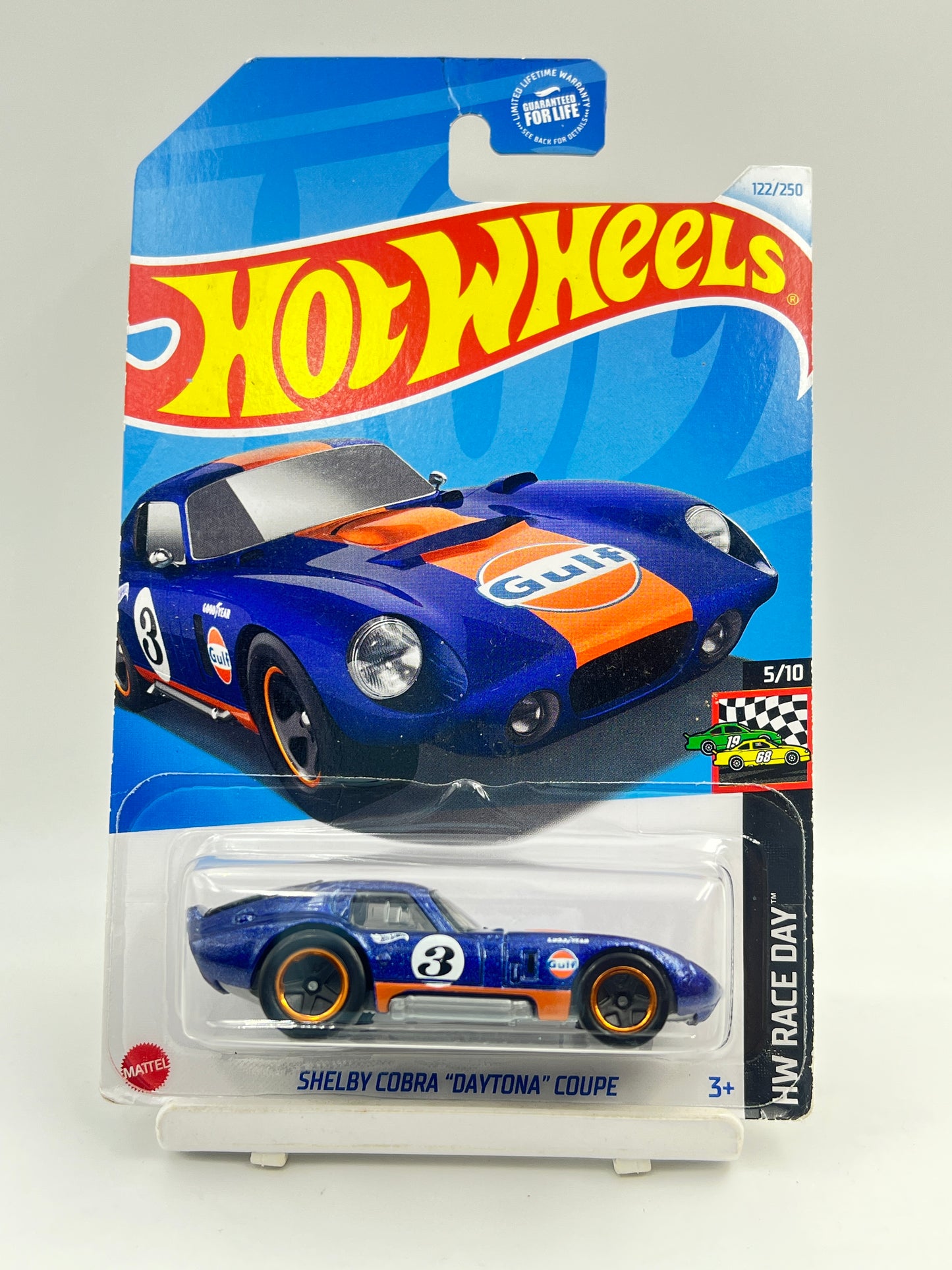 MILD CREASE - IMPORTED - HOT WHEELS - SHELBY COBRA DAYTONA COUPE -GULF - 3A