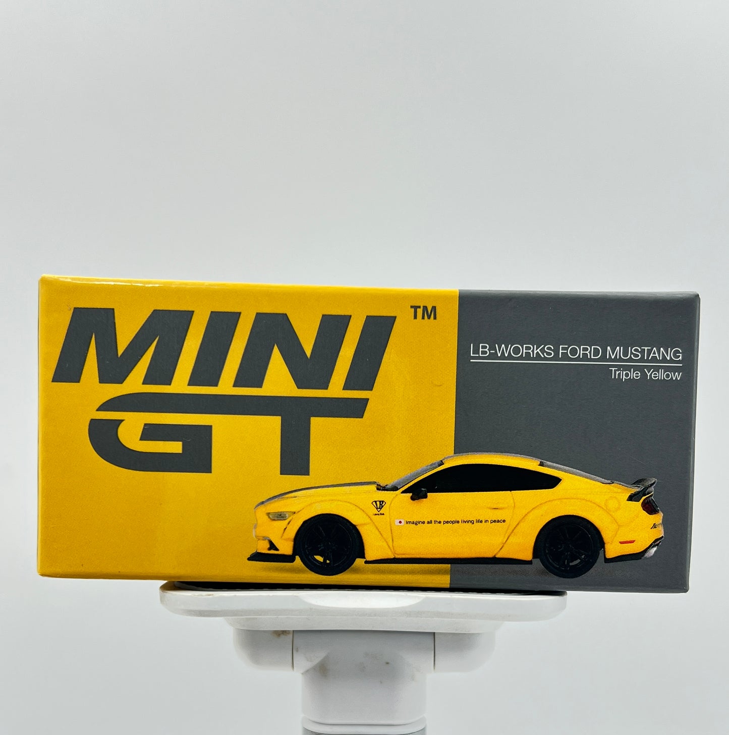 MINI GT - UNSEALED - #1077 - LB WORKS FORD MUSTANG - TRIPLE YELLOW