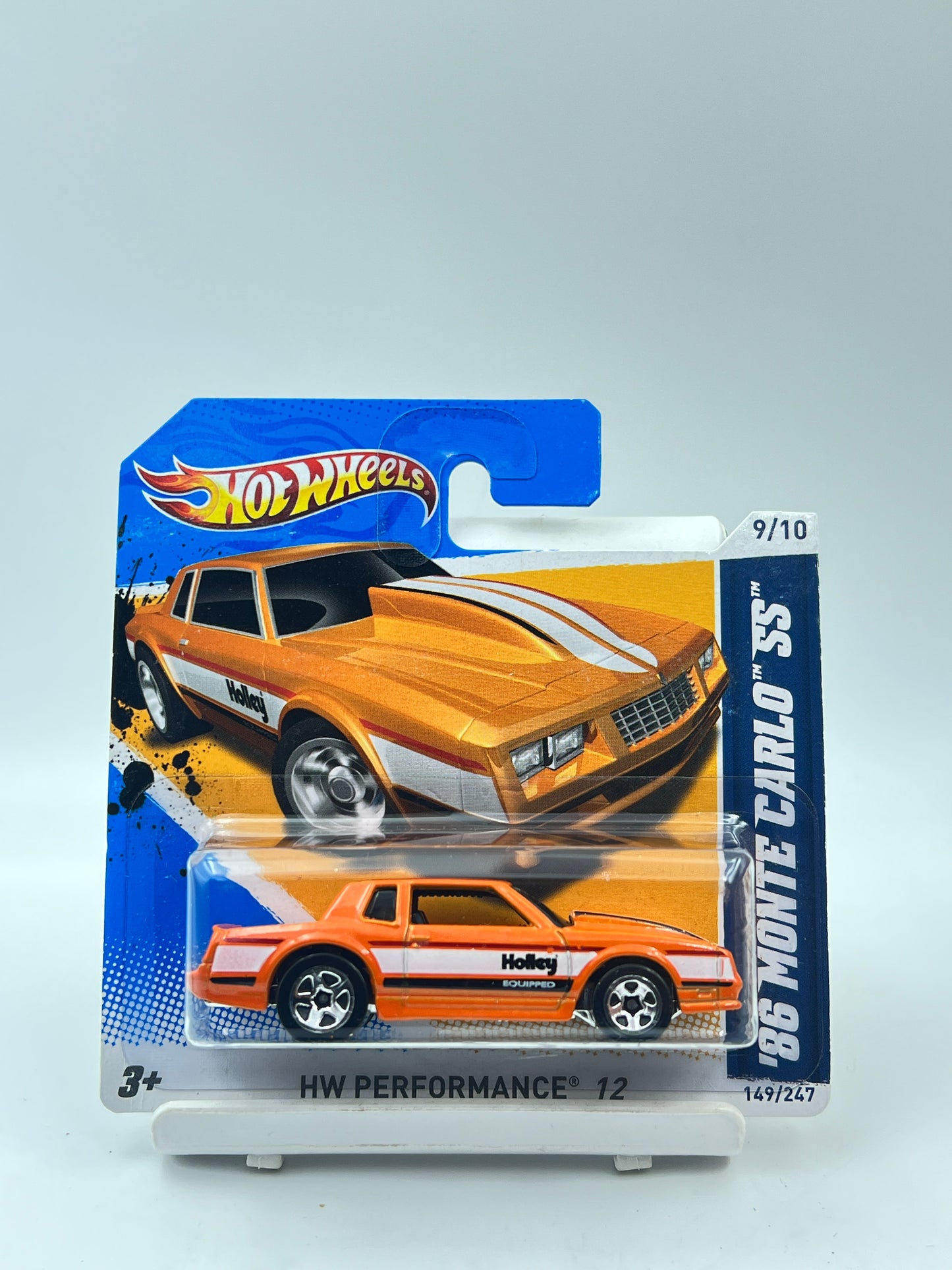 IMPORTED - HOT WHEELS - 86 MONTE CARLO SS - ORANGE SHORT CARD - 6B