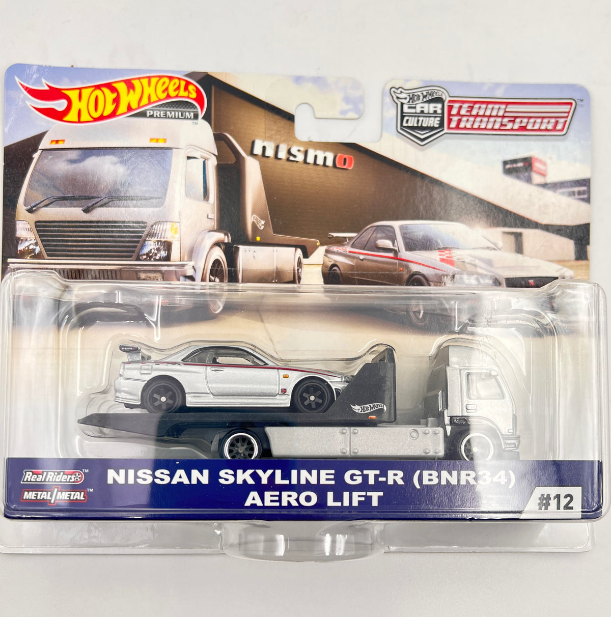 CREASED CARD - TEAM TRANSPORT - HOT WHEELS - NISSAN SKYLINE GT-R (BNR34) / AERO LIFT