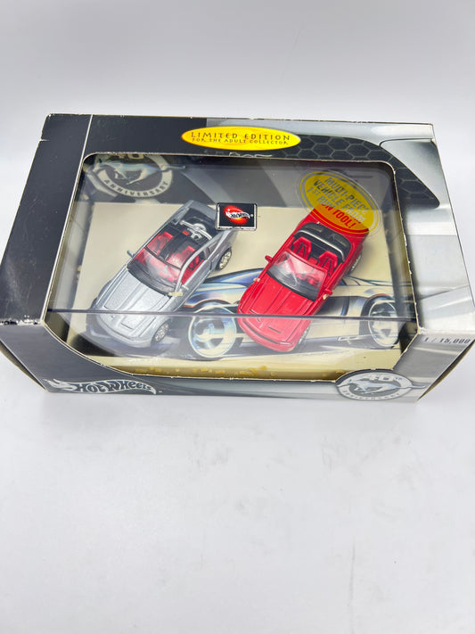 HOT WHEELS ORIGINALS -TWIN PACK - MUSTANG GT/ MUSTANG GT CONVERTIBLE - ACRYLIC CASE SEALED - RUBBER BAND RESIDUE DUE TO AGEING