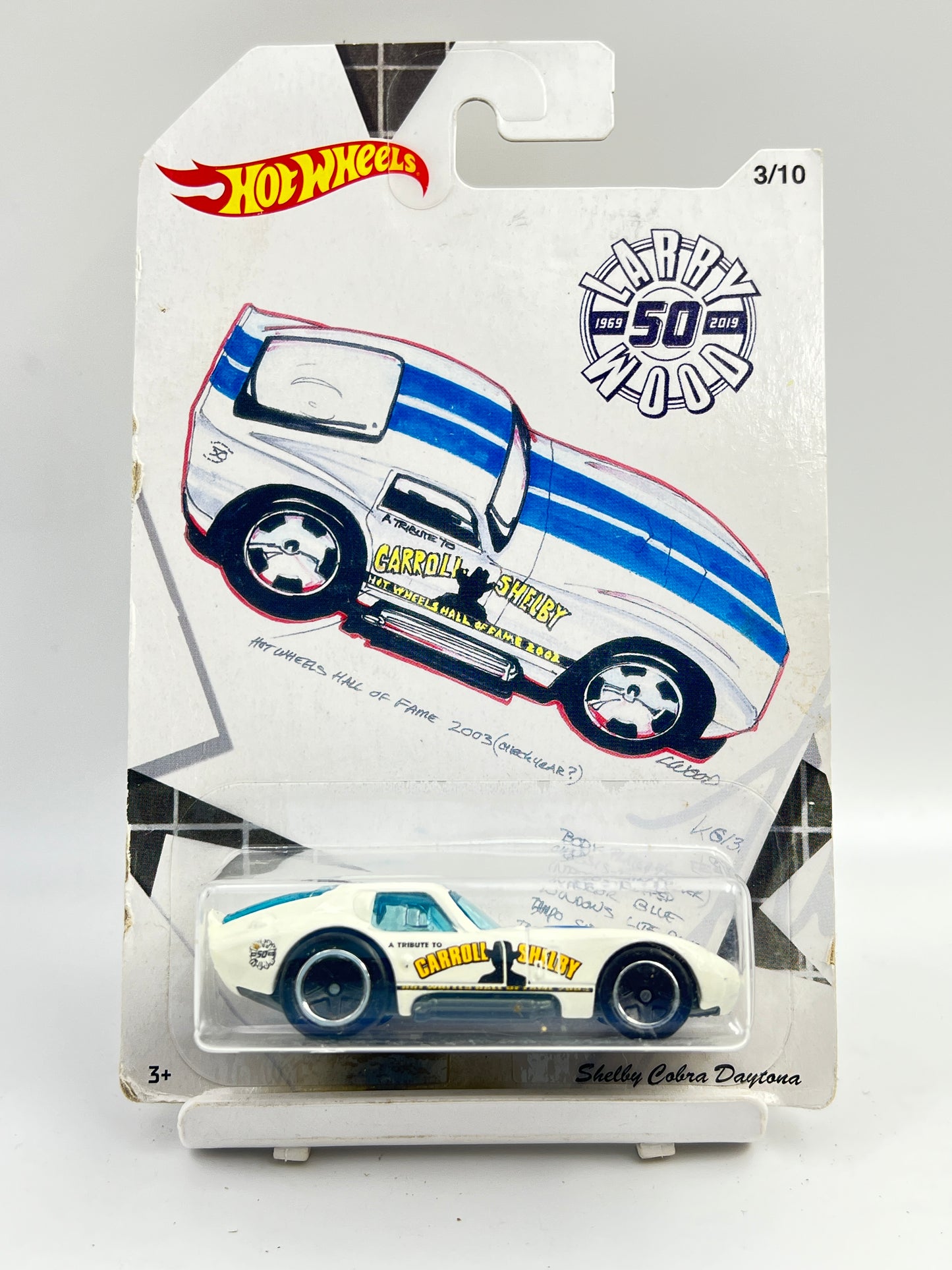 CARD DAMAGED AT BOTTOM - SOFT CORNERS - IMPORTED - HOT WHEELS -  LARRY WOOD - SHELBY COBRA DAYTONA - 6C
