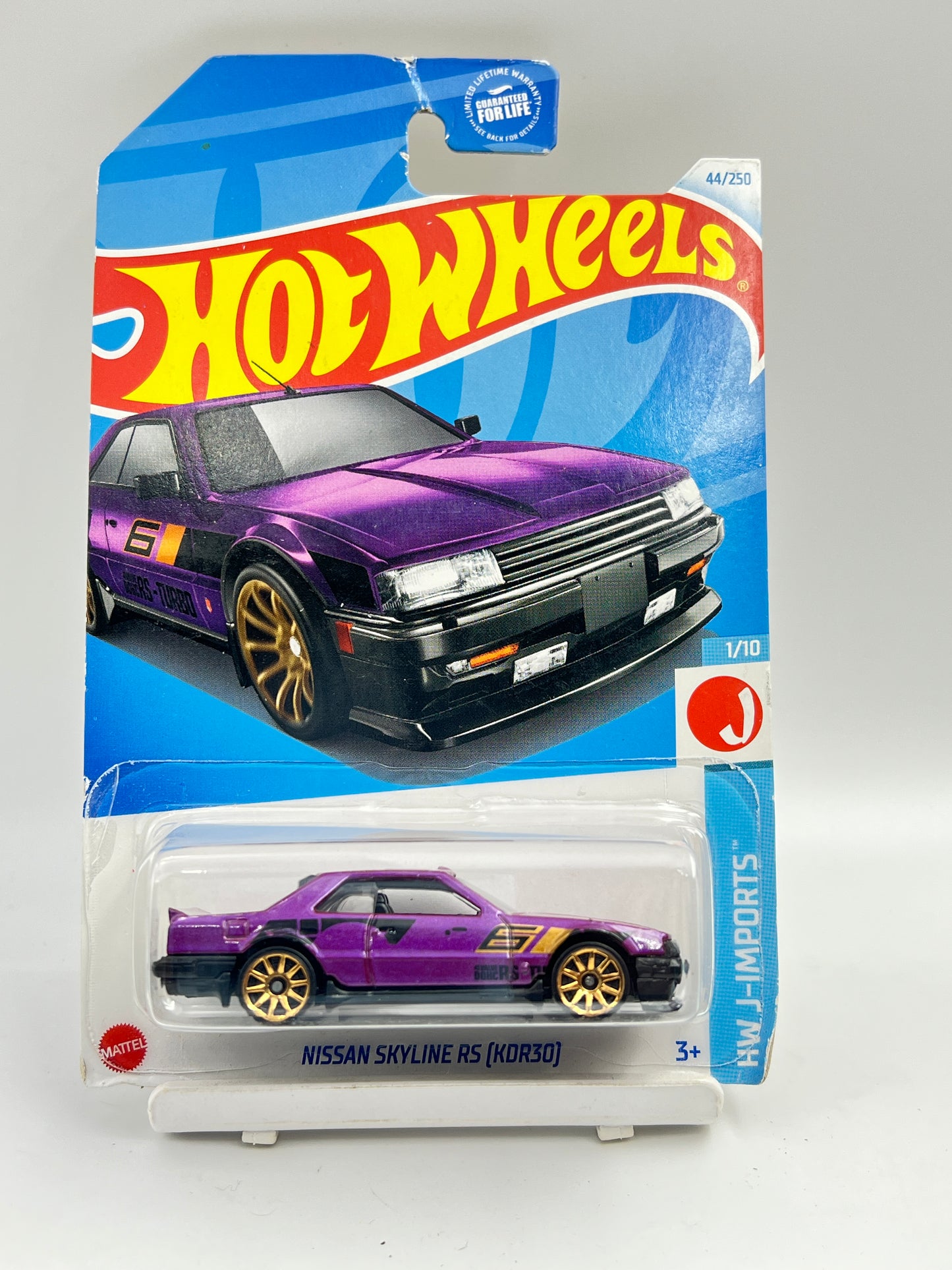 CREASED - IMPORTED - HOT WHEELS -  NISSAN SKYLINE RS (KDR30) - PURPLE - 2A