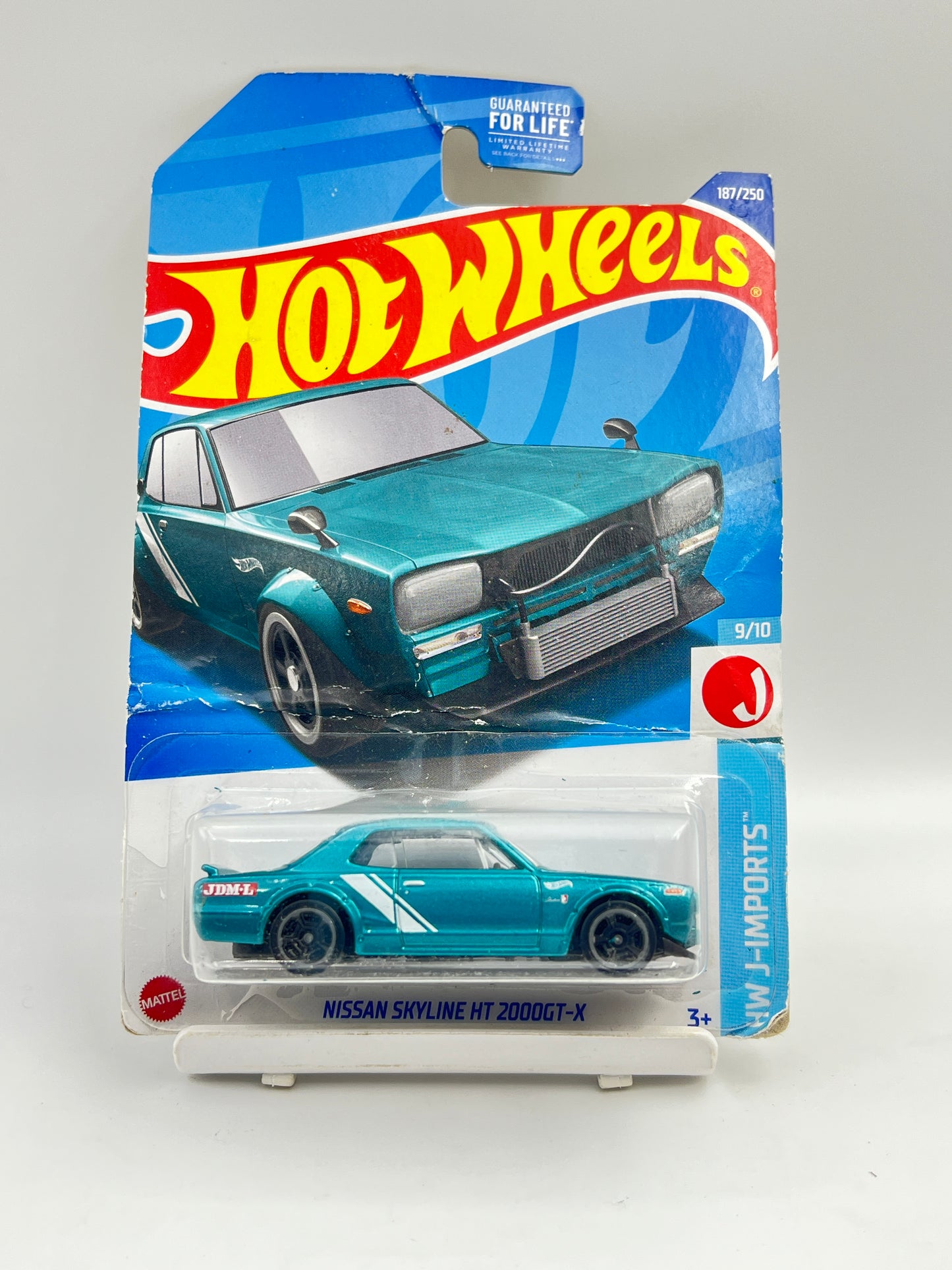 HEAVY DAMAGED CARD - IMPORTED - HOT WHEELS -  NISSAN SKYLINE 2000GT-X - 4F