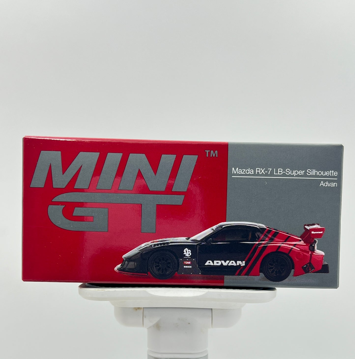 MINI GT - UNSEALED -#983 MAZDA RX-7 LB-SUPER SILHOUETTE - ADVAN