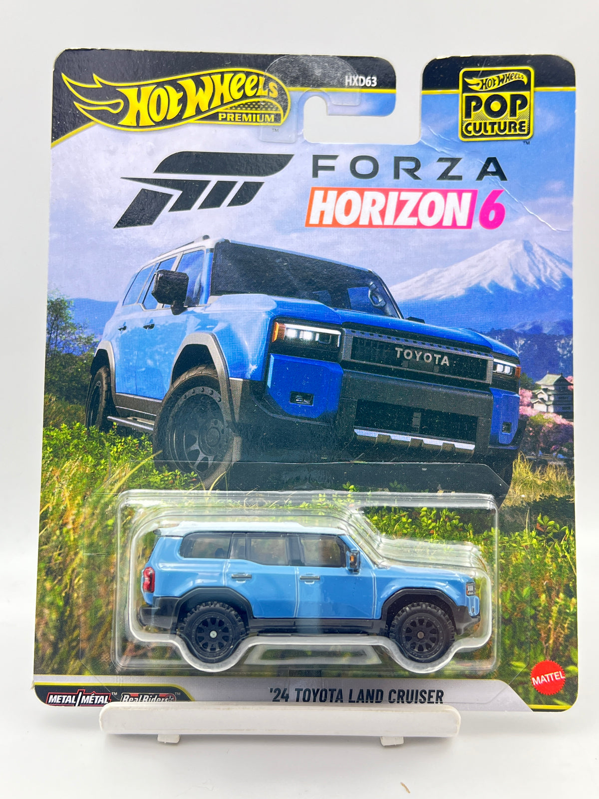 CREASED - HOT WHEELS - PREMIUM - 24 TOYOTA LAND CRUISER - 4G